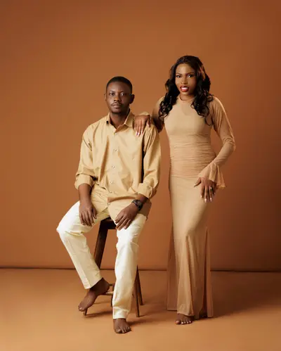 Opeyemi and Mayowa in champagne-coloured outfits