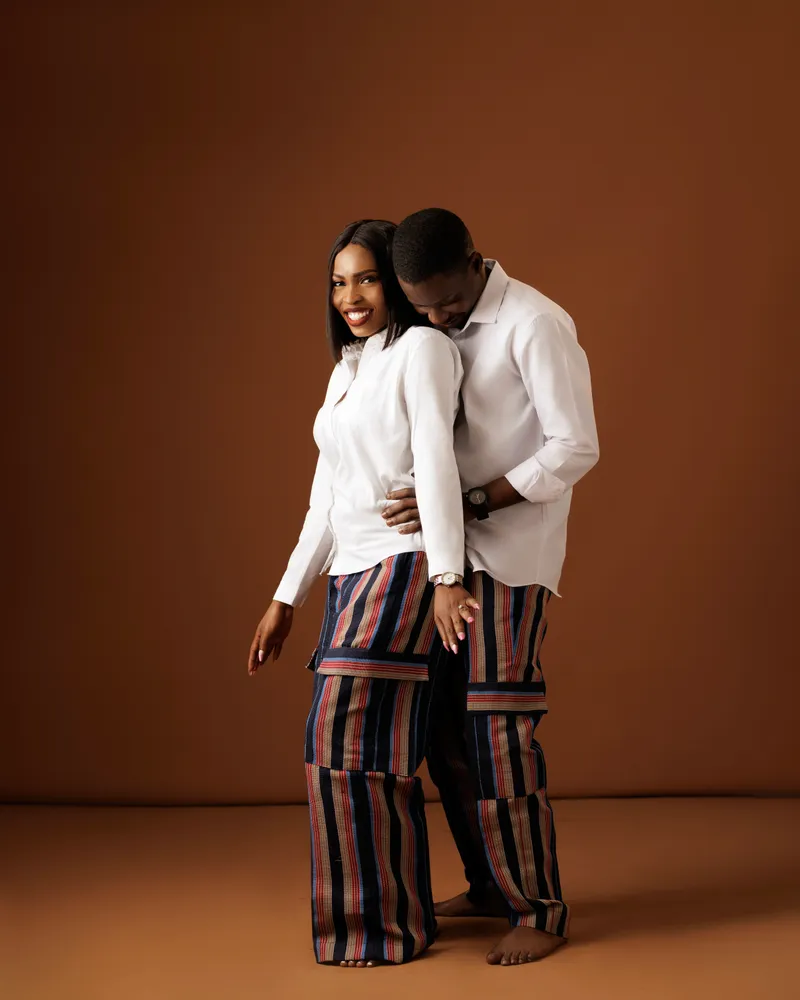 Opeyemi and Mayowa sharing a quiet embrace